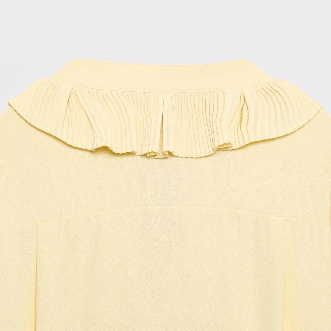 Blus med volangdetaljer och knytband samt asymmetrisk midikjol set