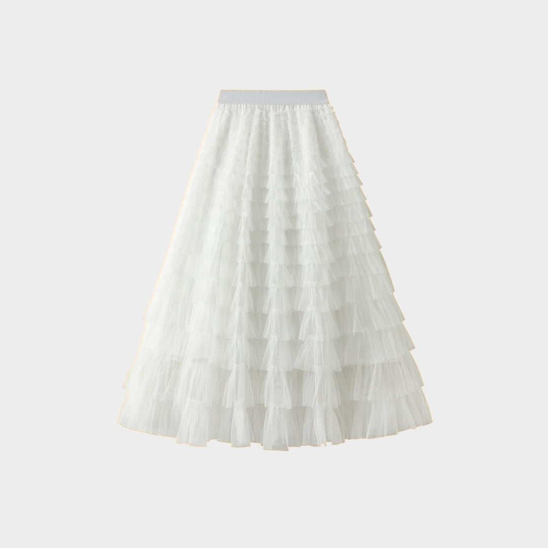 Kjol i mesh med plisserade lager naturlig midja och avslappnad passform