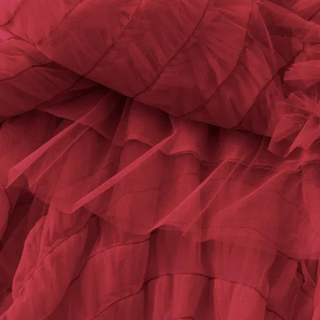 Kjol i mesh med volanger empiremidja A-linje silhuett och lagerstruktur