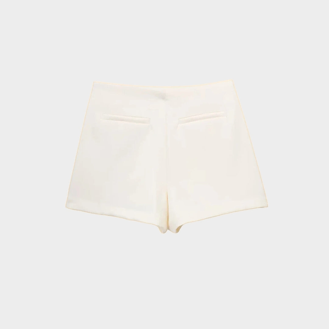 Asymmetrisk miniskort med omlott design och hög midja