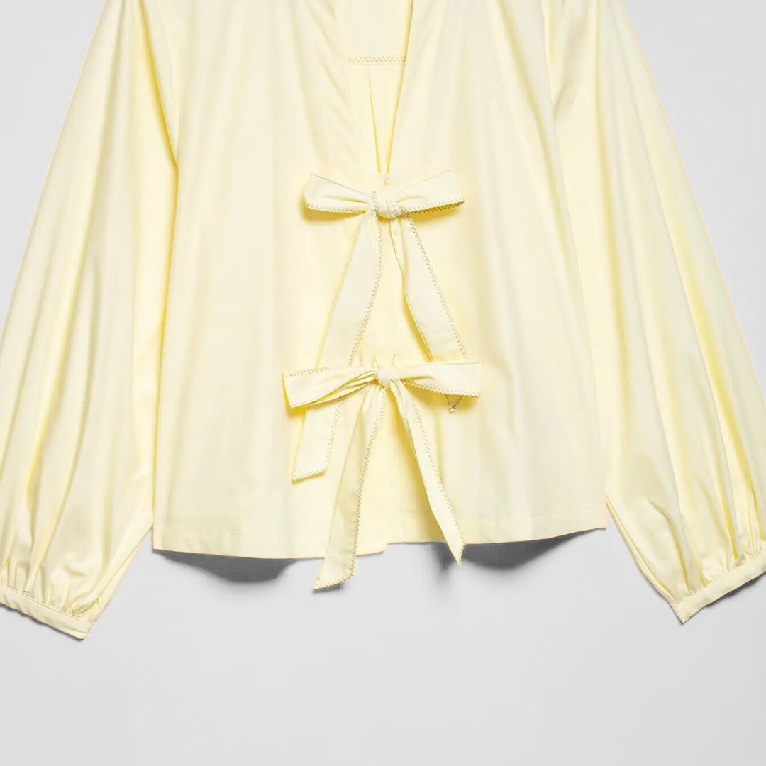 Blus i poplin med knytband och ränder