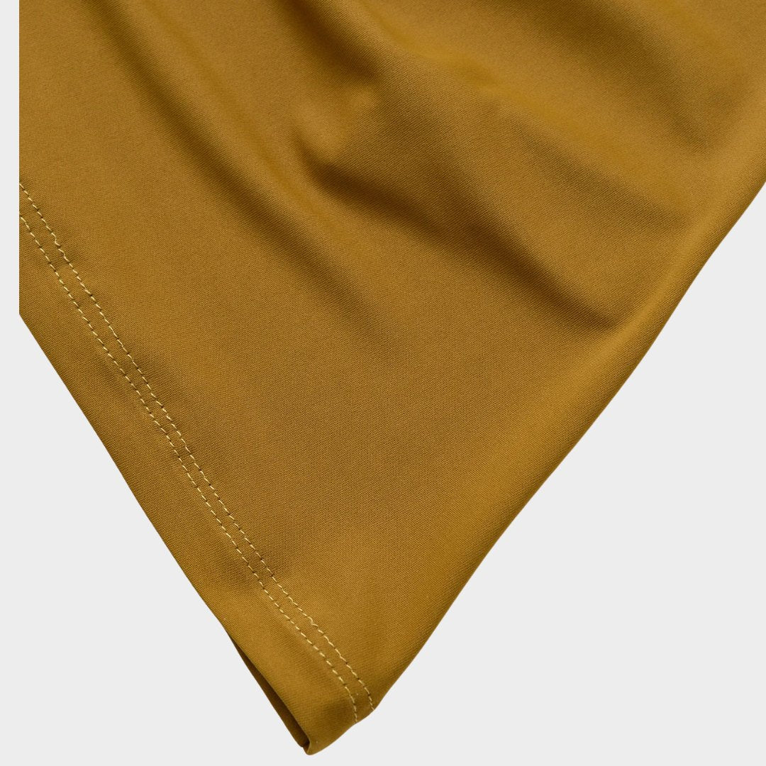 Stickad väst med ränder och asymmetrisk fåll