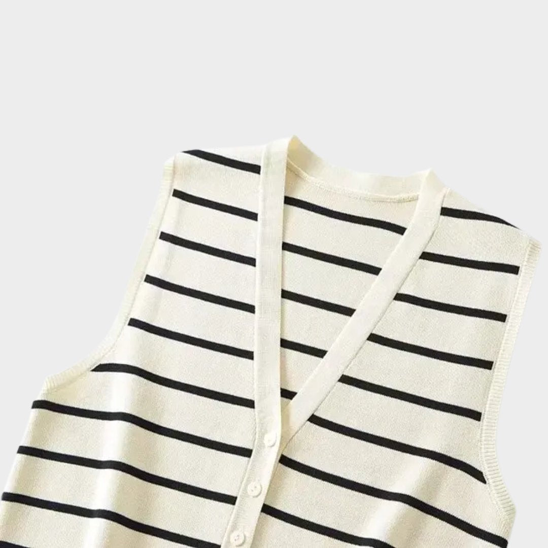 Stickad väst med ränder och asymmetrisk fåll