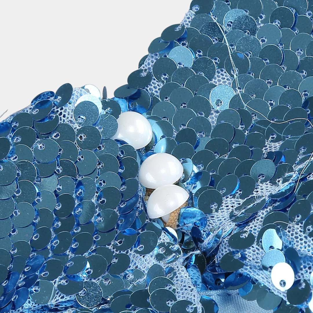 Blå paljettklänning i bodycon-modell med ärmlös design