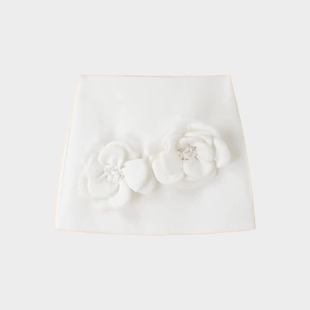 Tvådelat set med blommiga applikationer och ärmlös topp