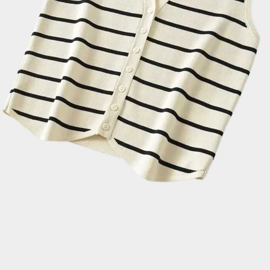 Stickad väst med ränder och asymmetrisk fåll