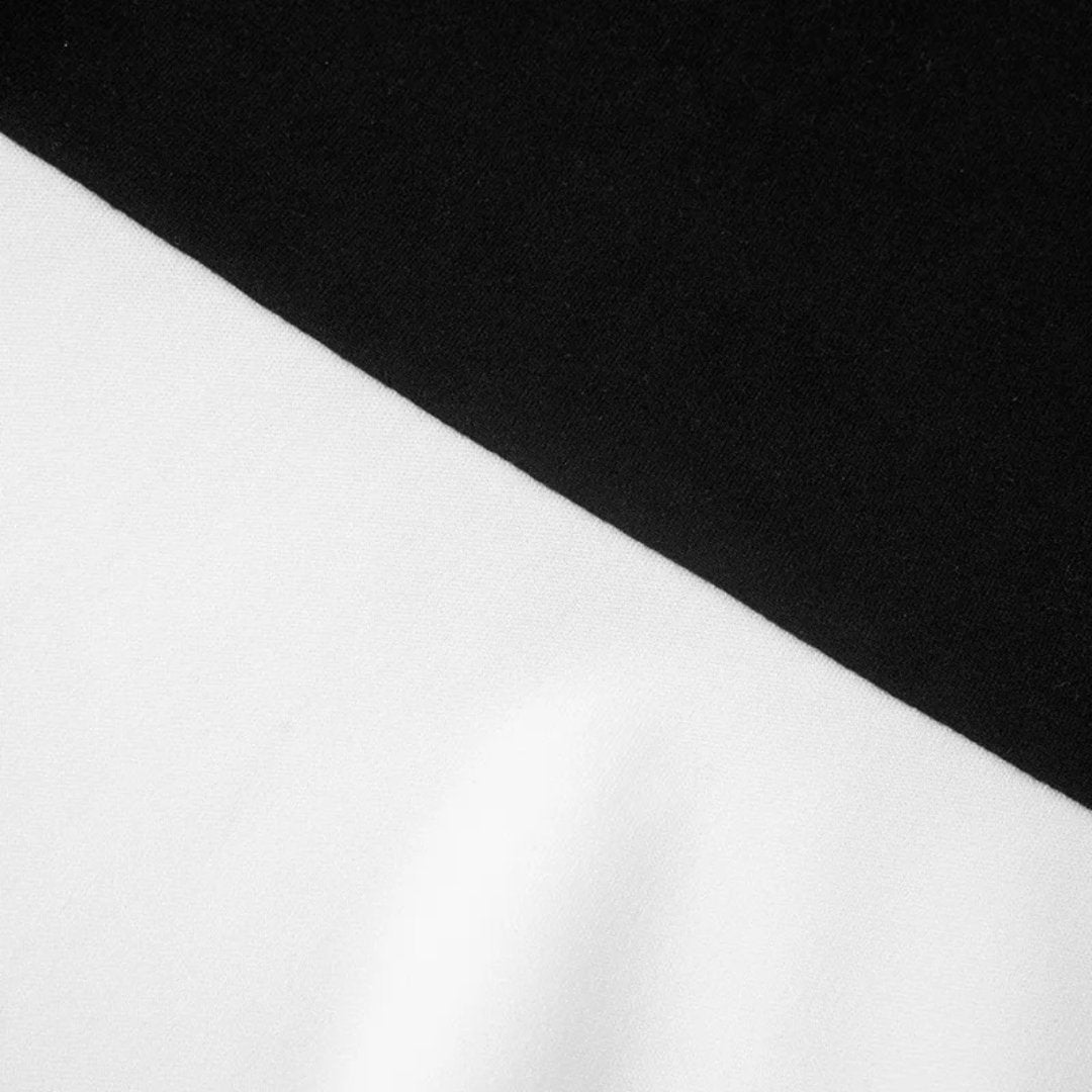 Tvåfärgad trikåklänning med polokrage och halvlånga ärmar