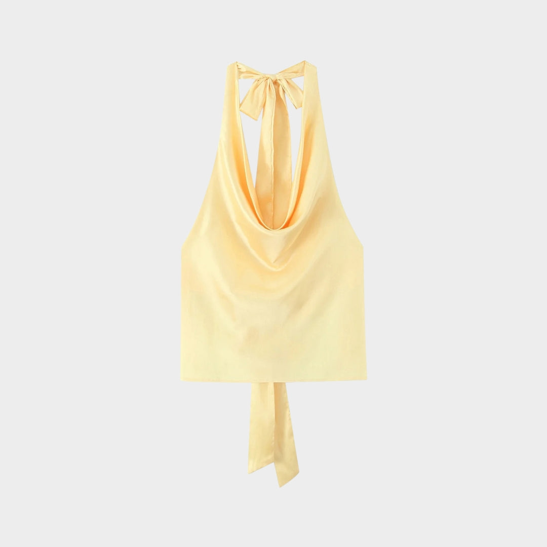 Satintopp med halterneck, knytband och öppen rygg i sommarstil