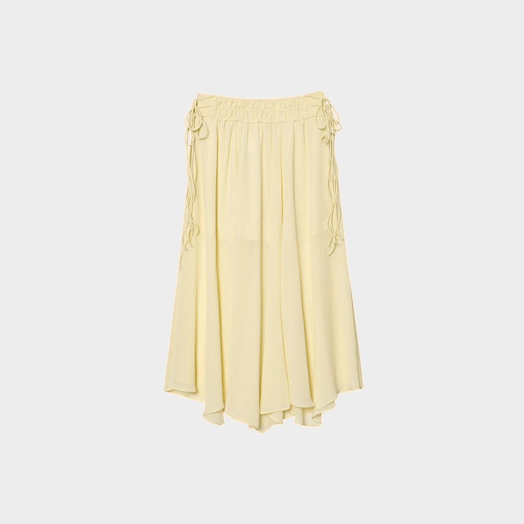 Blus med volangdetaljer och knytband samt asymmetrisk midikjol set