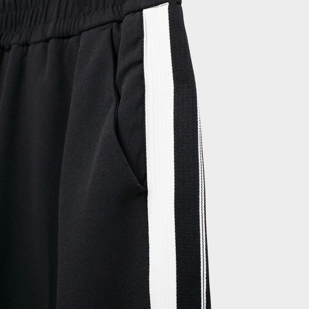 Tvådelad svart chique tracksuit i tjockt stretchmaterial med kontrastbyxor