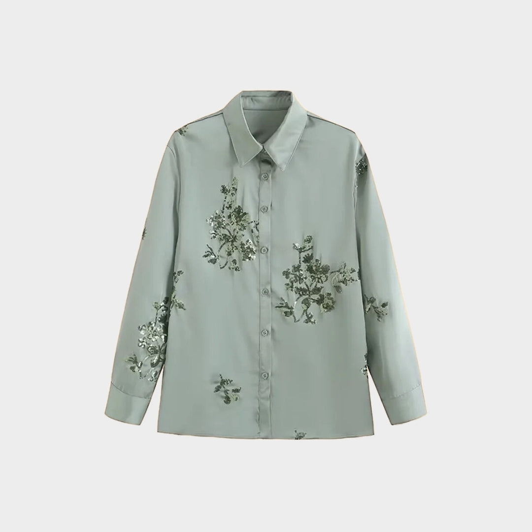 Tvådelat set med blommigt mönster och vida byxor