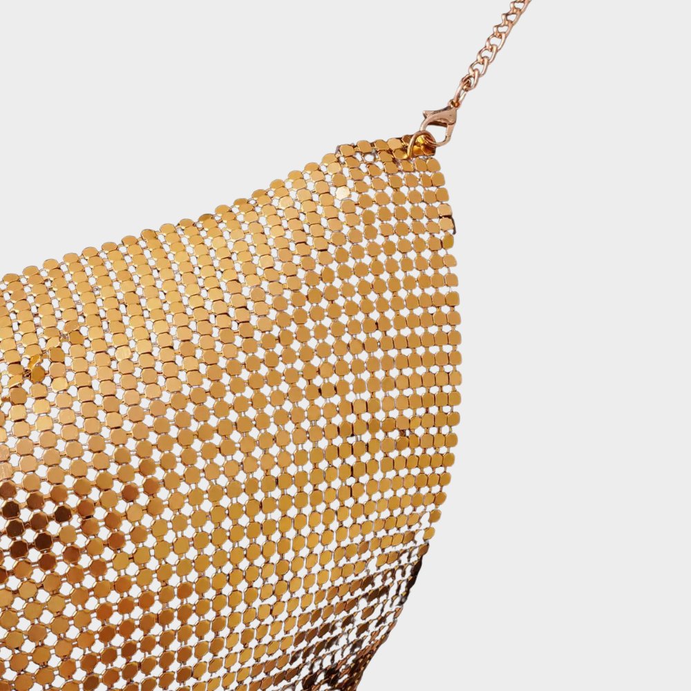 Paljettlinne med kedjeband och öppen rygg i clubstil