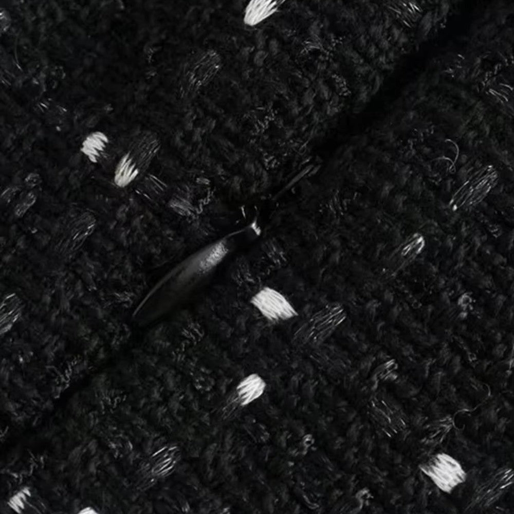 Svart ärmlös miniklänning med pärldetaljer