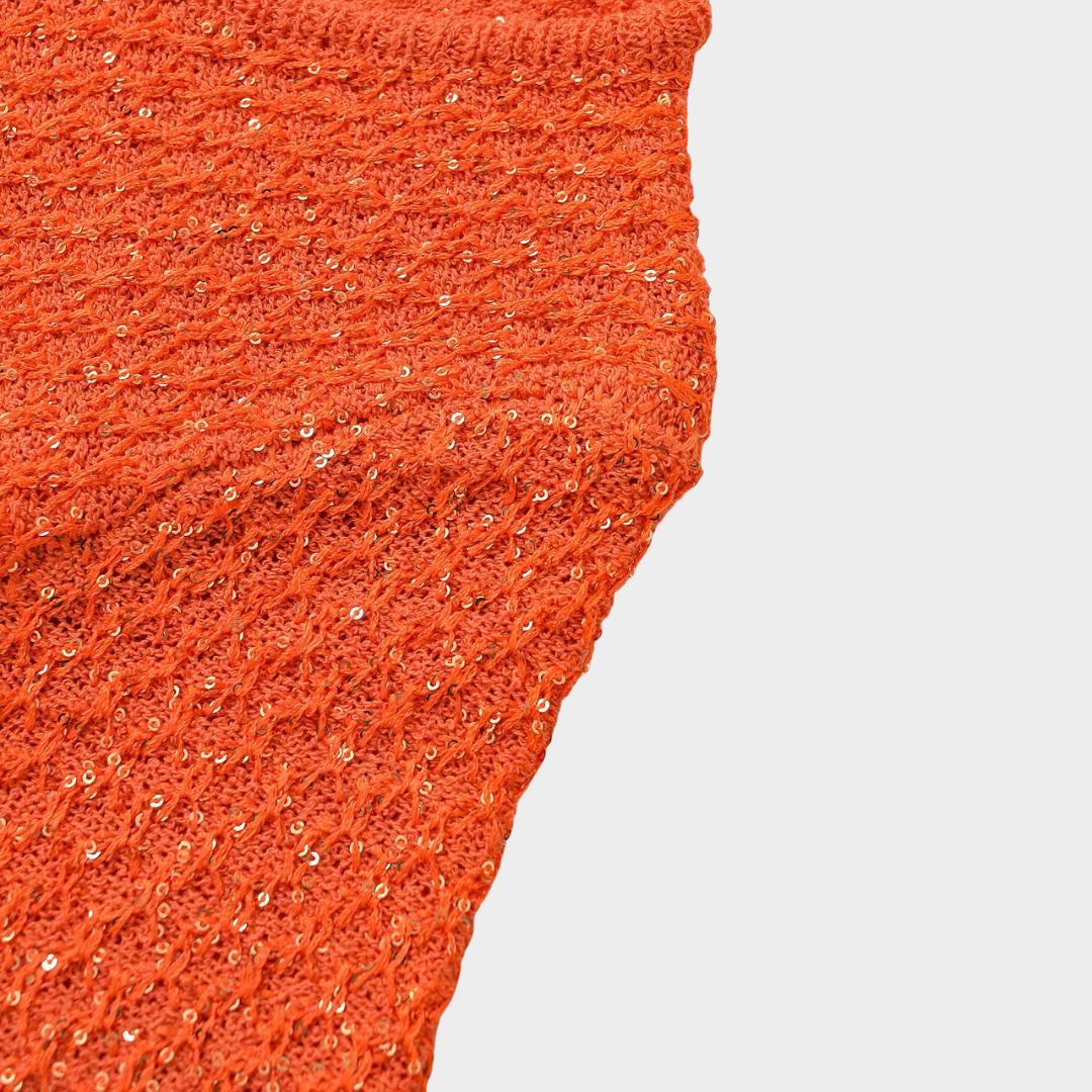 Orange stickad kofta med kort ärm paljettdetaljer och dekorativ knapp