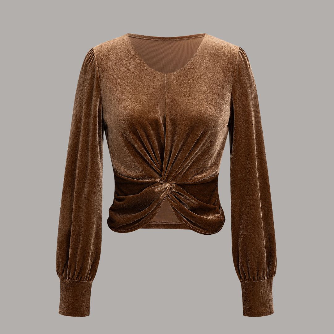 Brun sammetsblus med lång ärm och tvistad drapering i midjan