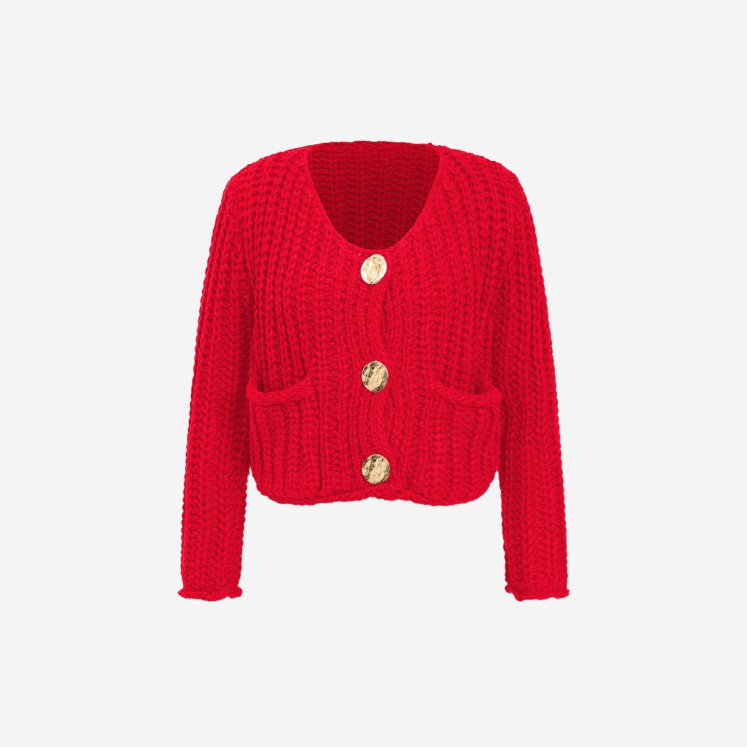 Chunky stickad kofta med stora knappar och påsydda fickor