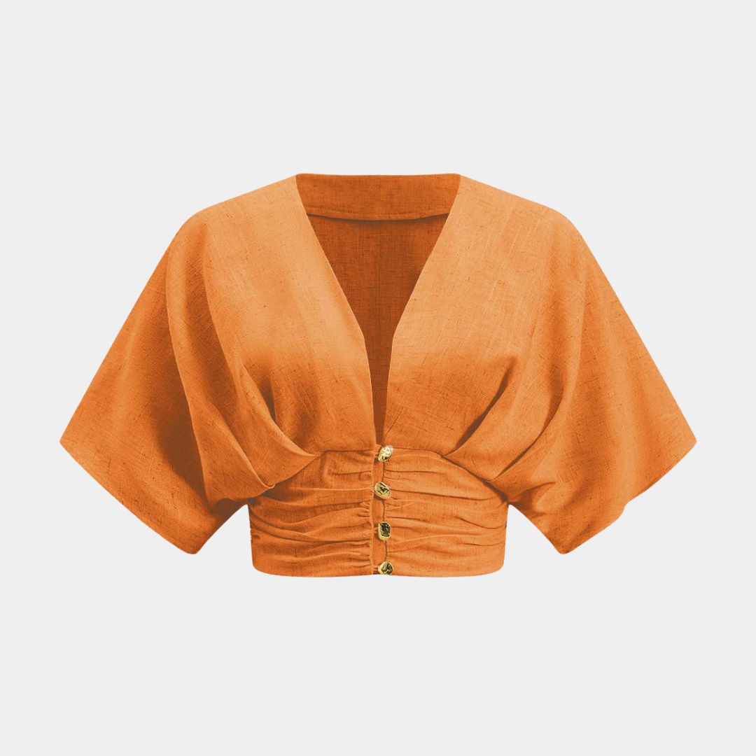 Kortärmad topp i linne med avslappnad passform och lätt struktur