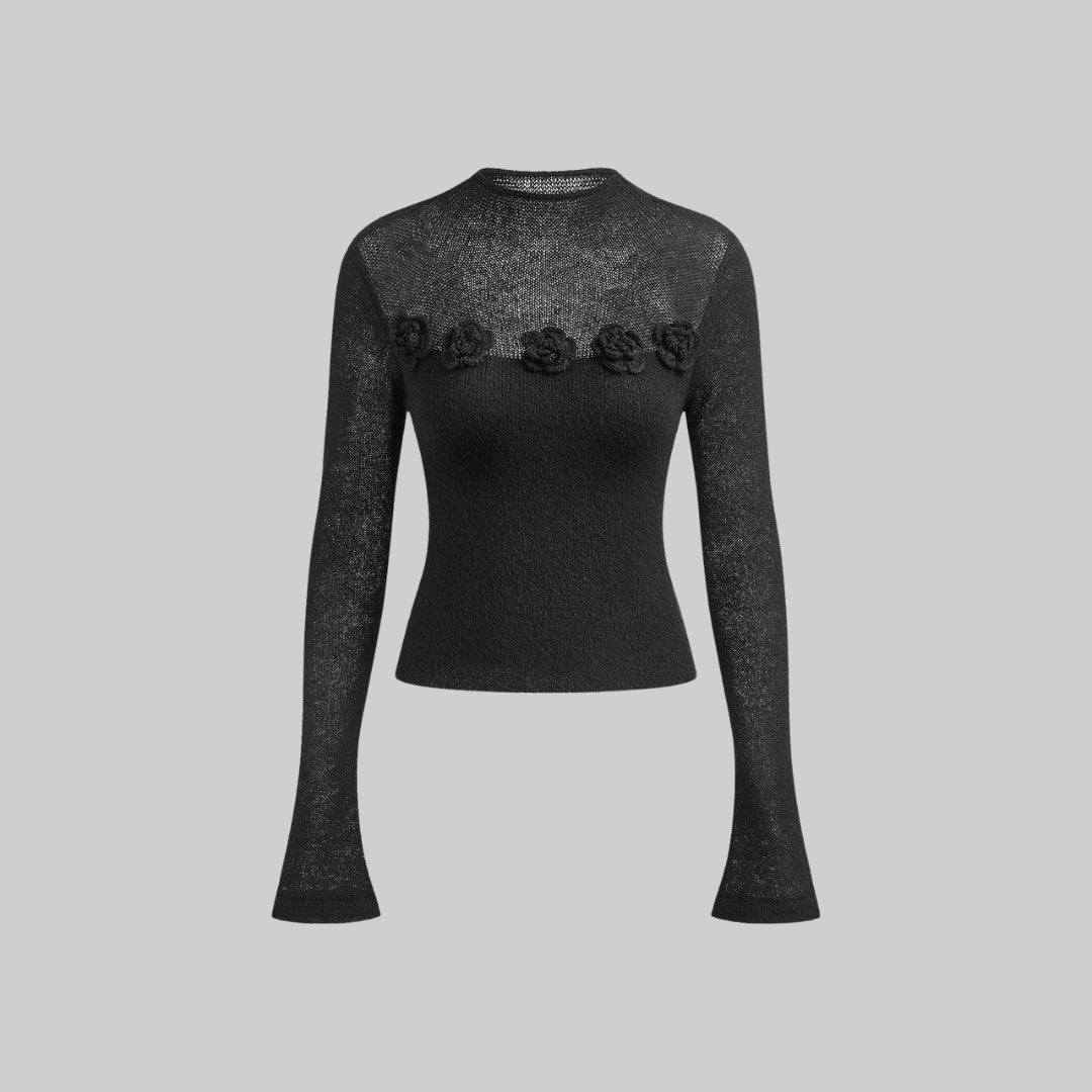 Tunn stickad topp med 3D-blommor och transparent överdel i ullmix