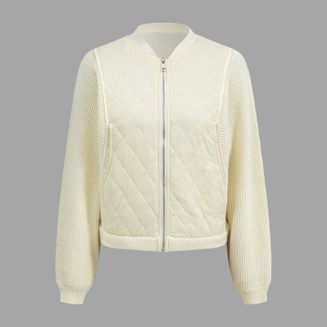 Fitted-passform quiltad stickad jacka med dragkedja och kontrasterande ärmar