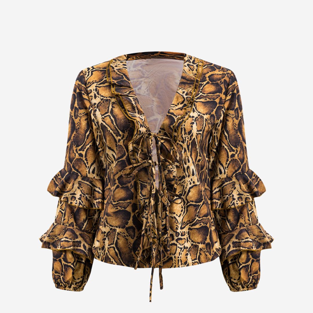 Brun blus med leopardmönster volangärmar och knytning framtill