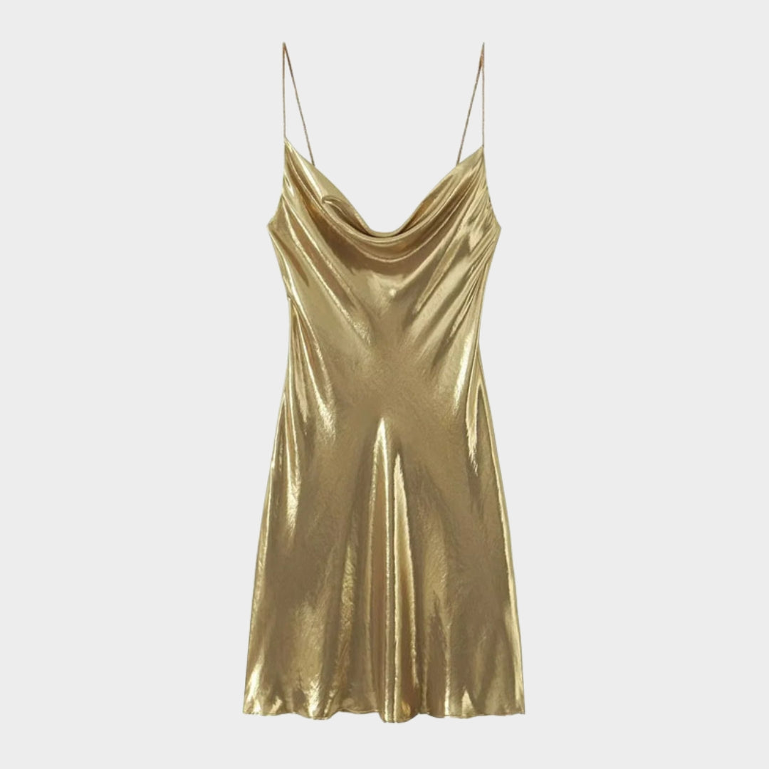 Glittrande miniklänning med smala axelband och öppen rygg