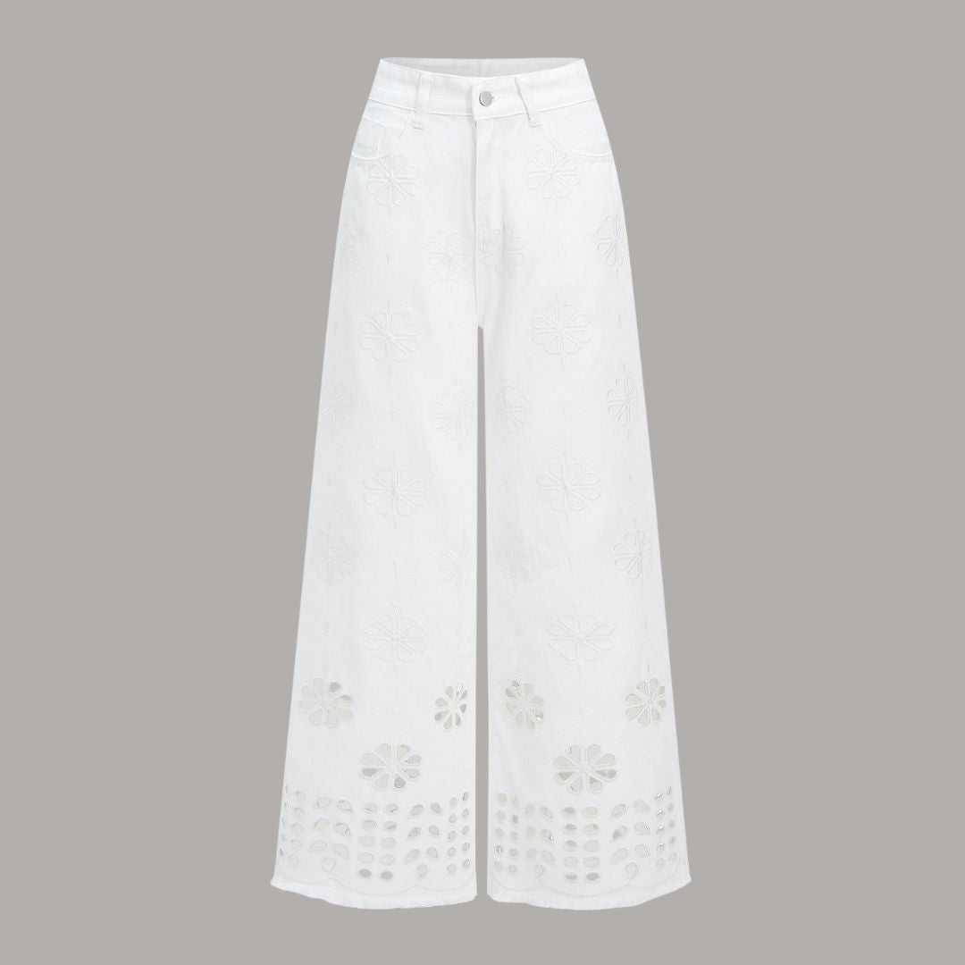Vita vida jeans med blombroderi och utskurna detaljer