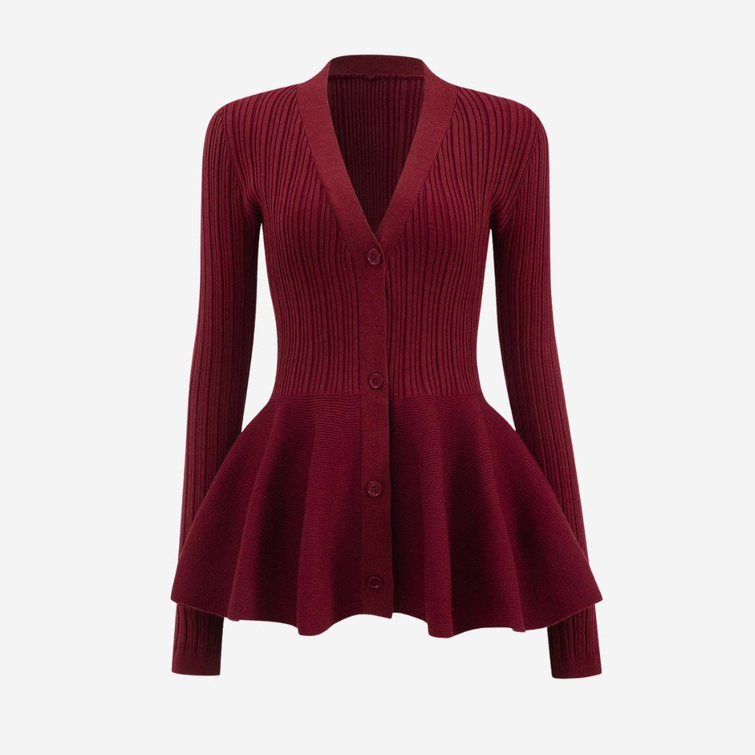 Stickad kofta med peplumdesign och knappstängning framtill