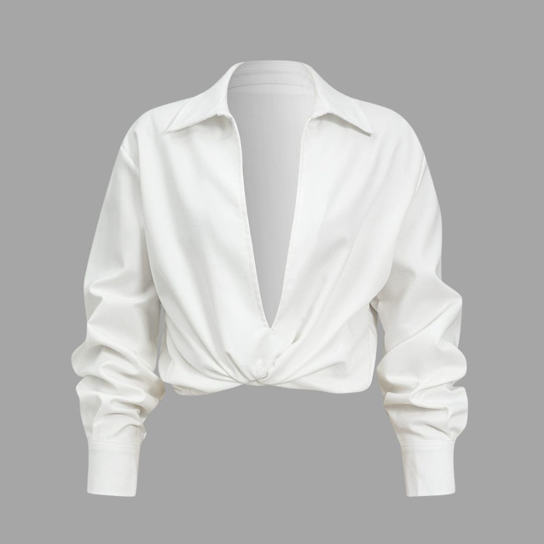 Vit blus med djup V-ringning och långa ärmar i vävt tyg