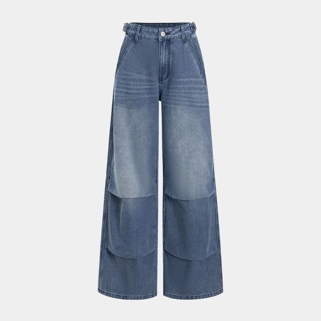 Mörkblå denimbyxor med veckade sidsömmar, panelkonstruktion och bred silhuett i kraftig tvättad bomullsblandning