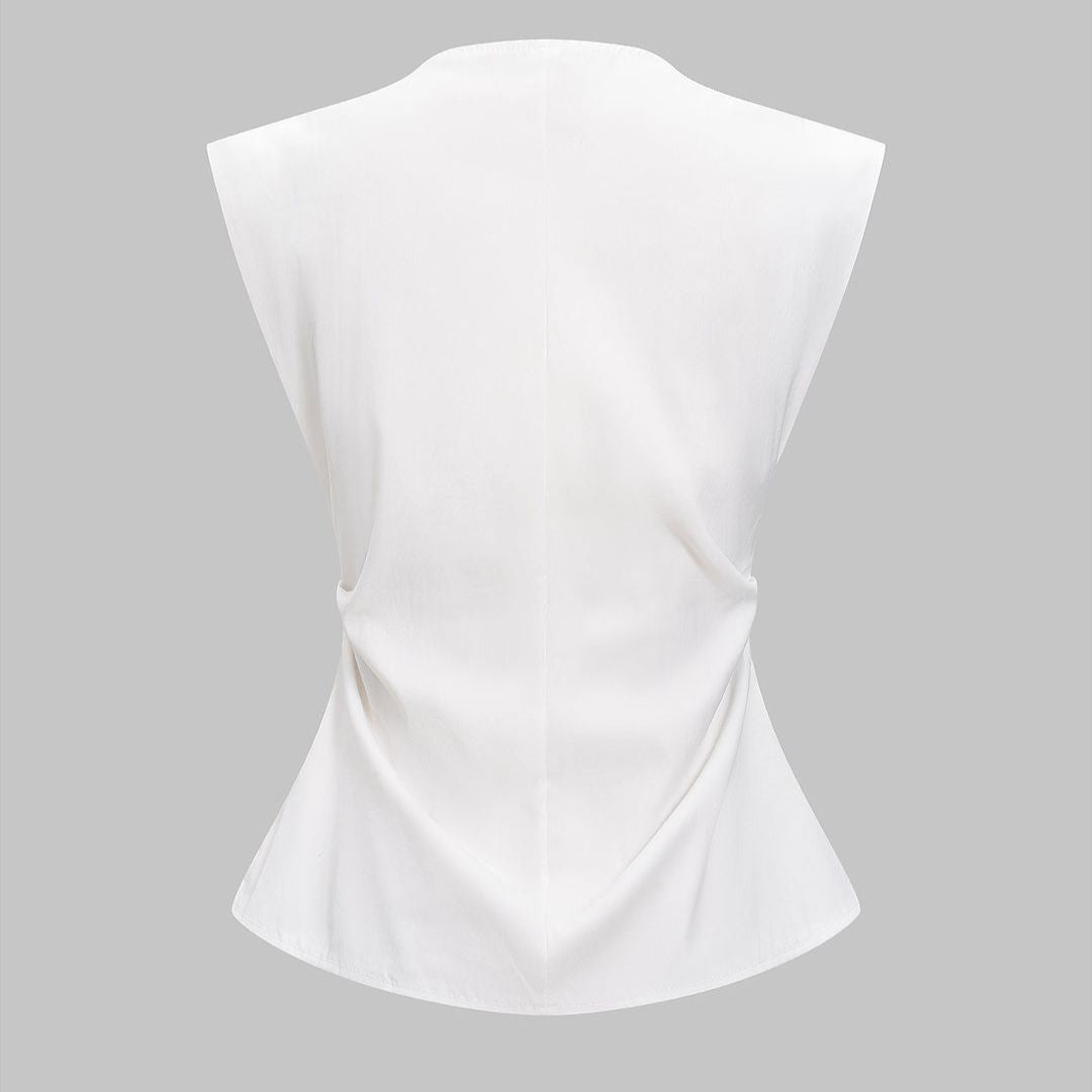 Vit ärmlös figursydd topp i twill med guldfärgade knappar och V-ringning för dam