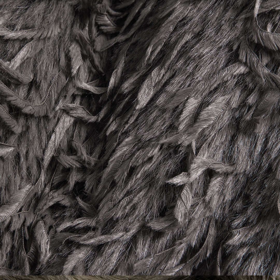 Grå jacka i fuskpäls med långhårig textur och lös passform för dam