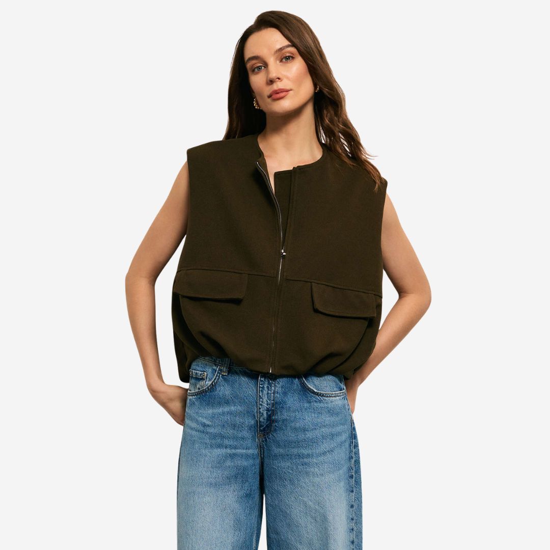 Mörkgrön ärmlös jackväst i strukturerat tyg med dragkedja och ficklock för dam