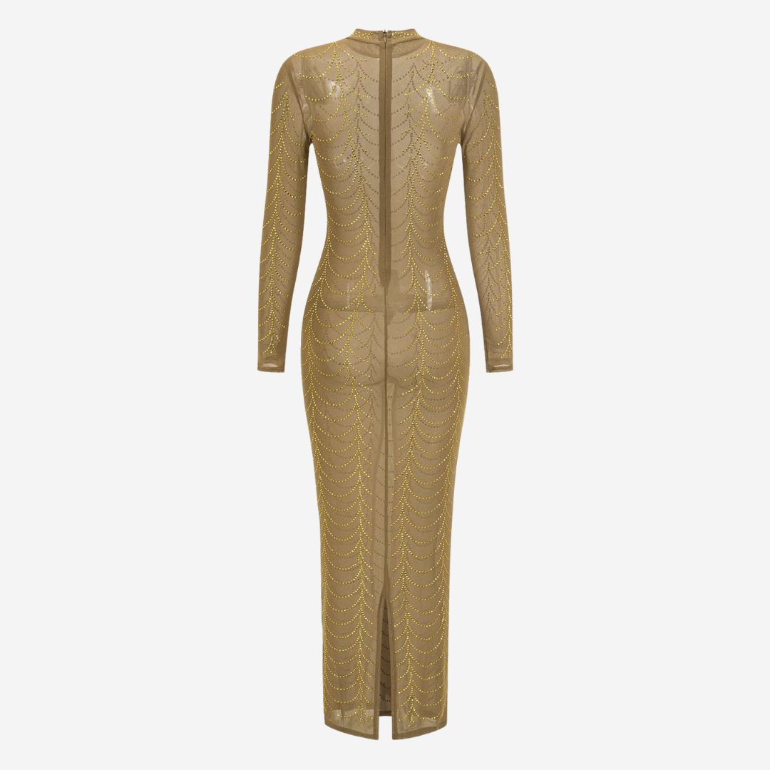 Guld lång figurnära klänning i mesh med gnistrande dekor och sofistikerad transparens