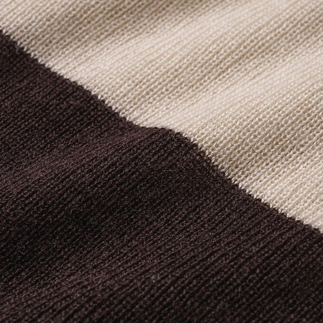 Beige Stickad maxikjol med kontrastkant och lätt textur för en stilren vardagslook