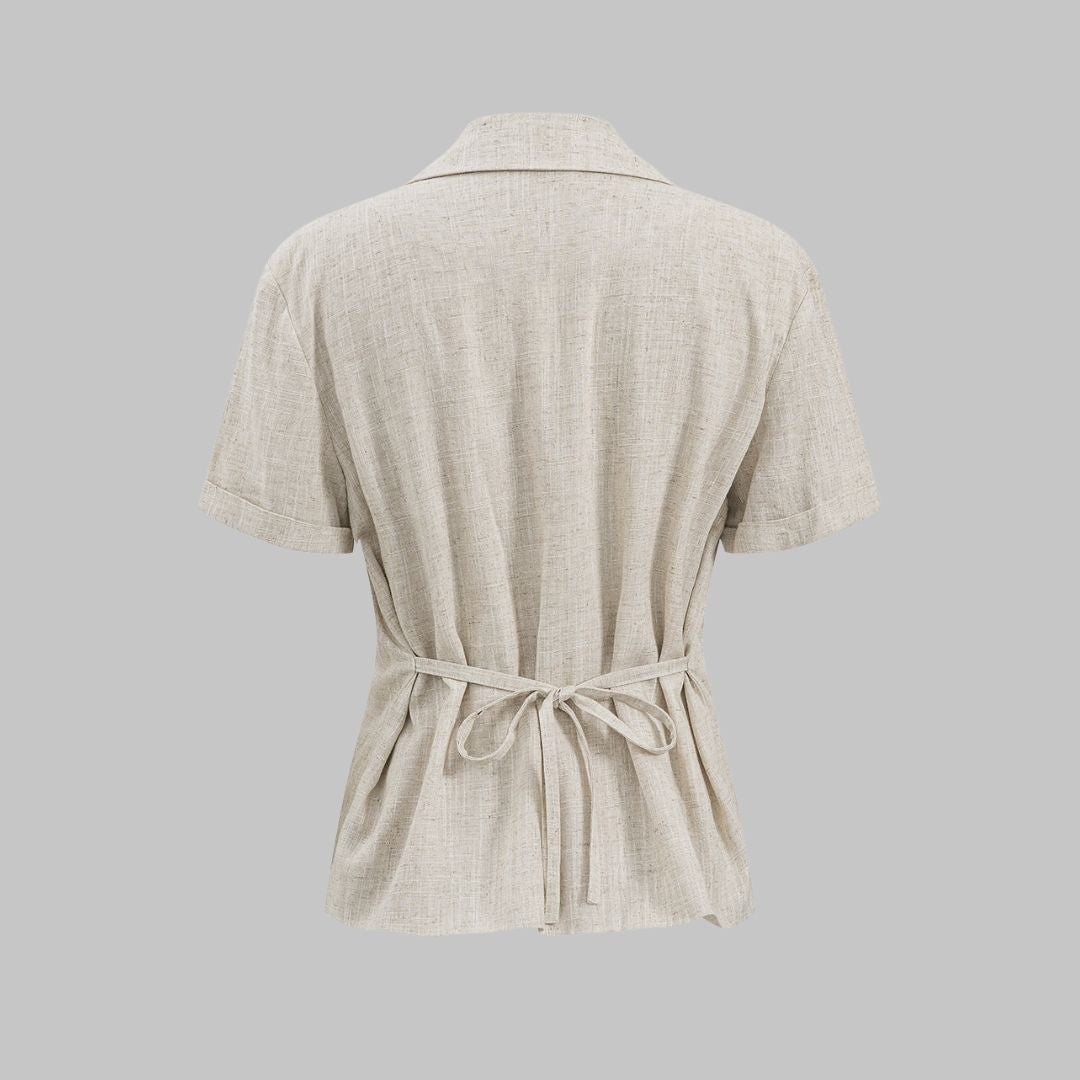 Beige figurnära topp i linne- och viskosblandning med kort ärm och rund halsringning