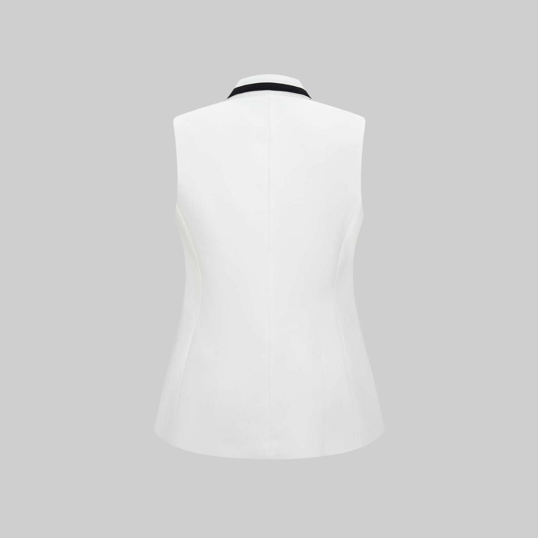 Vit ärmlös skräddarsydd väst i twill med dubbelknäppning och kontrastdetaljer