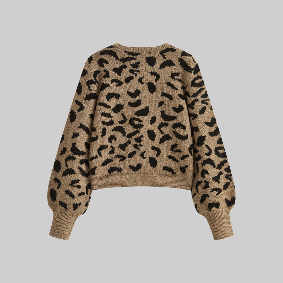 Stickad leopardmönstrad cardigan med svarta rosetter och ballongärmar