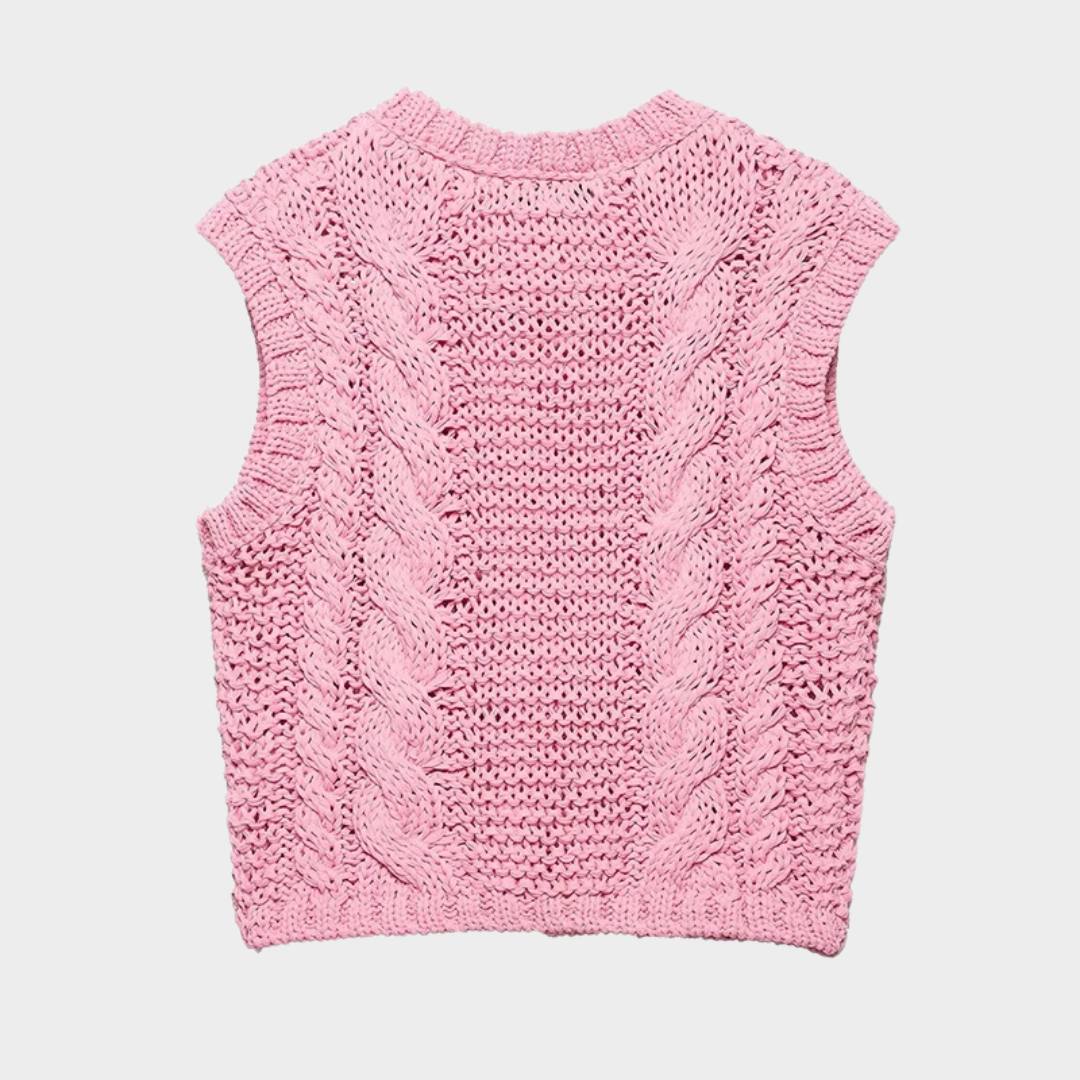 Rosa kabelstickad kofta utan ärmar med blomknappar