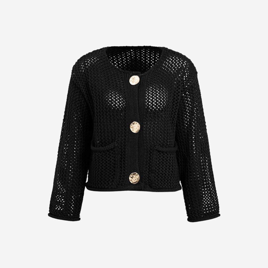 Stickad kofta i virkad struktur med fickor och stora dekorativa knappar