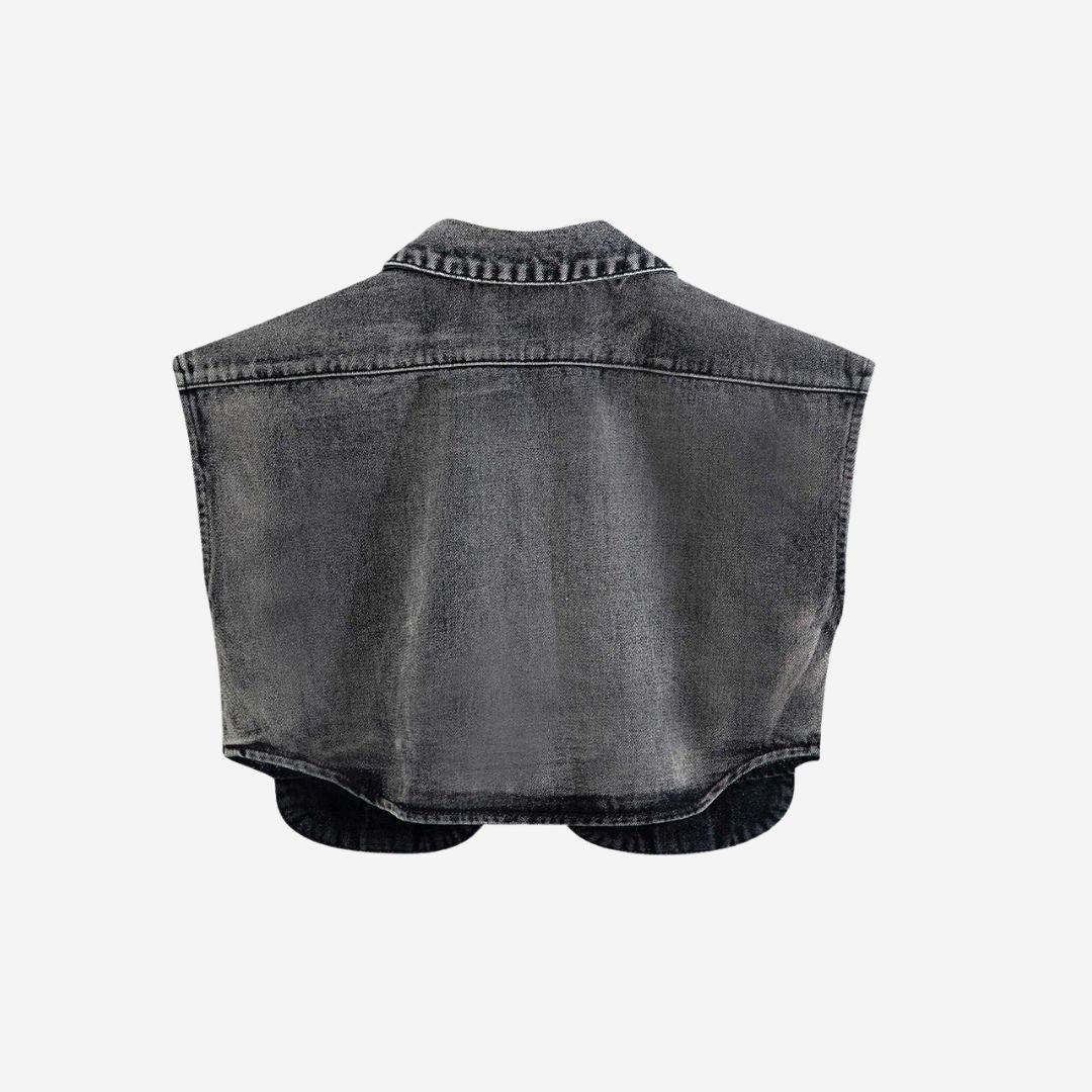 Extra kort ärmlös jeansväst med bröstfickor och tryckknappar i klassisk denim