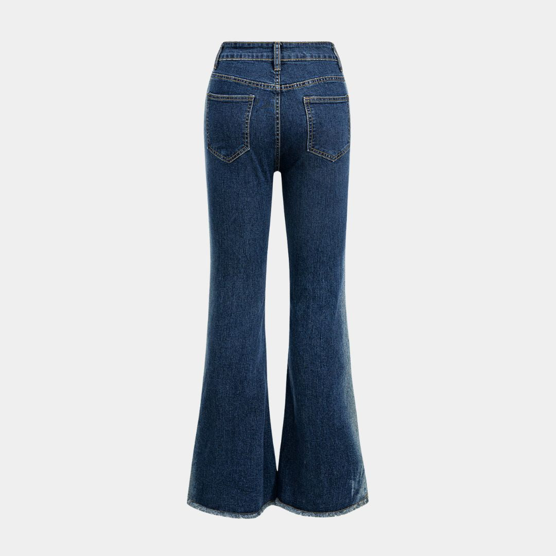 Mörkblå utsvängda jeans med hög midja, figursömmar och kontrasterande teddyfoder vid benslut