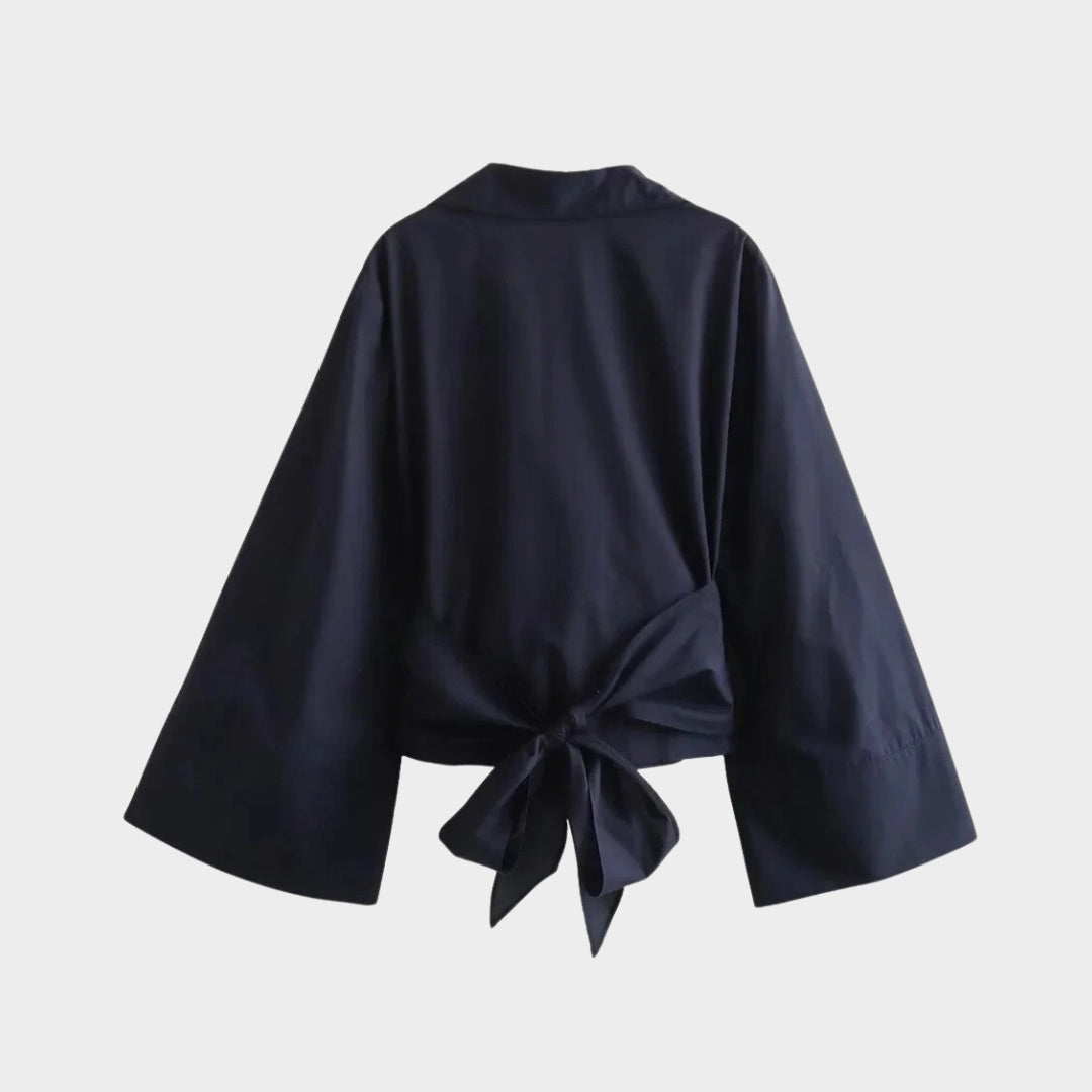 Omslagsblus med V-ringning och vida ärmar