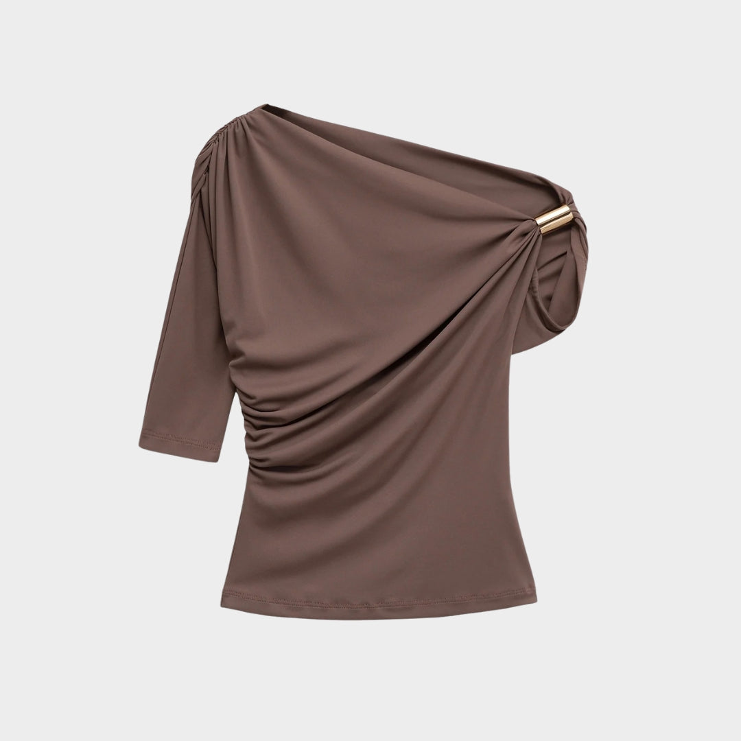 Stickad väst med ränder och asymmetrisk fåll