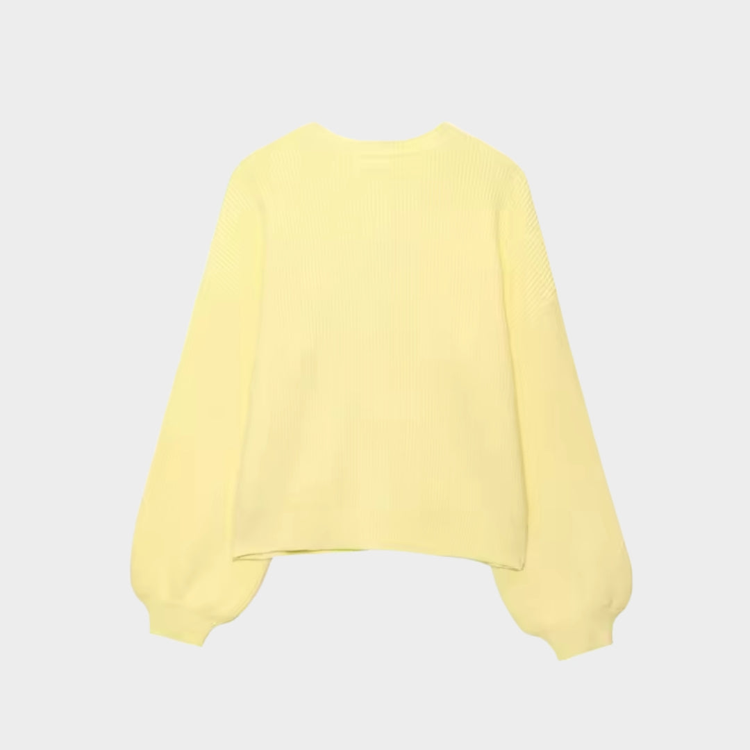 Gul stickad tröja med ballongärmar och knäppning
