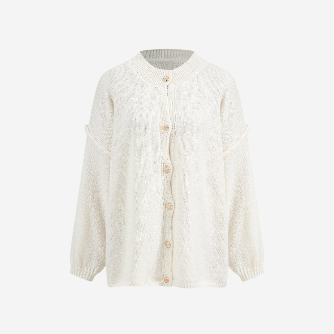 Stickad kofta med rund hals, knappstängning och långa ärmar med ribbade muddar