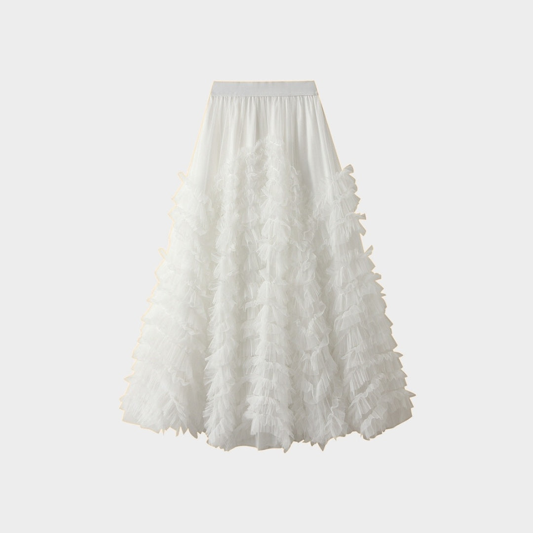 Kjol i mesh med volanger empiremidja A-linje silhuett och lagerstruktur