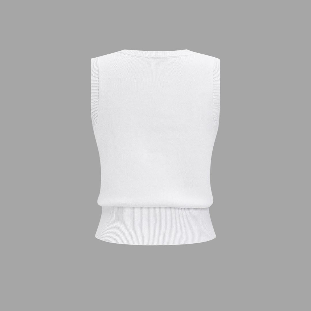 Ärmlös stickad topp med rund halsringning och knappdetaljer framtill