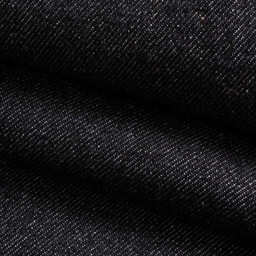 Svarta raka jeans med kontrasterande ylleinsats i midjan och grov diagonalväv i kraftig bomullsdenim