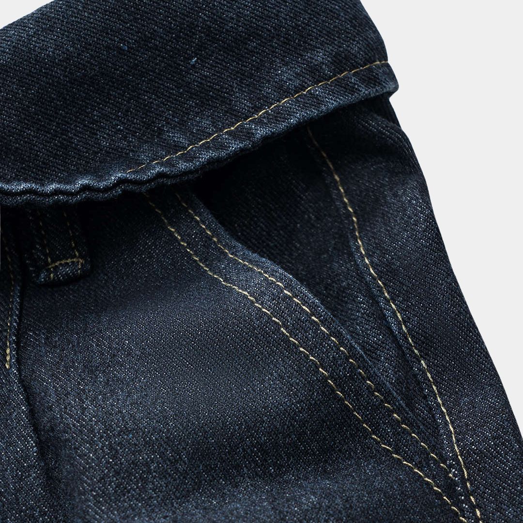 Mörkblä vida jeans med unik skjortkrage i midjan, bred silhuett och klassisk denimstruktur utan stretch