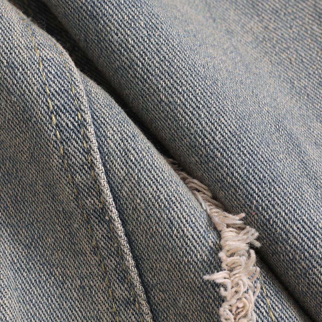 Patchwork-jeans med råa sömmar, hög midja och tvåtonad tvätt i rak silhuett